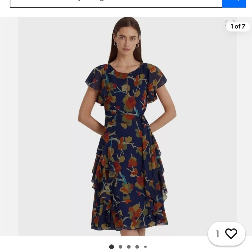 Ruffle trim navy background flower dress.